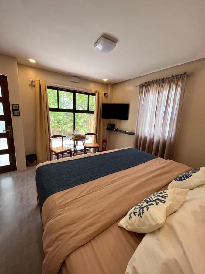 Southseas Beach Resort And Dive Center Santander Εξωτερικό φωτογραφία