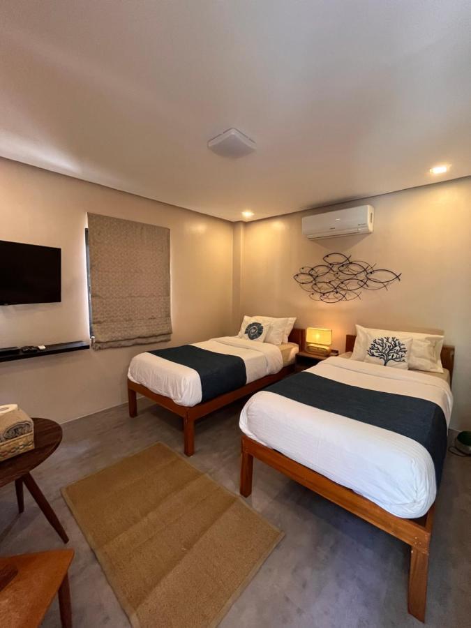 Southseas Beach Resort And Dive Center Santander Εξωτερικό φωτογραφία