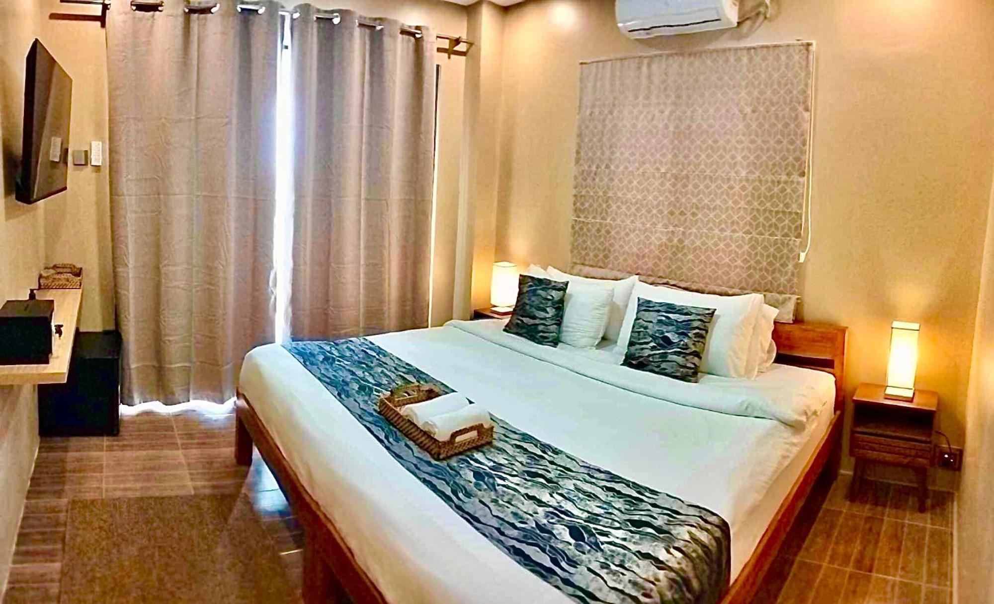 Southseas Beach Resort And Dive Center Santander Εξωτερικό φωτογραφία