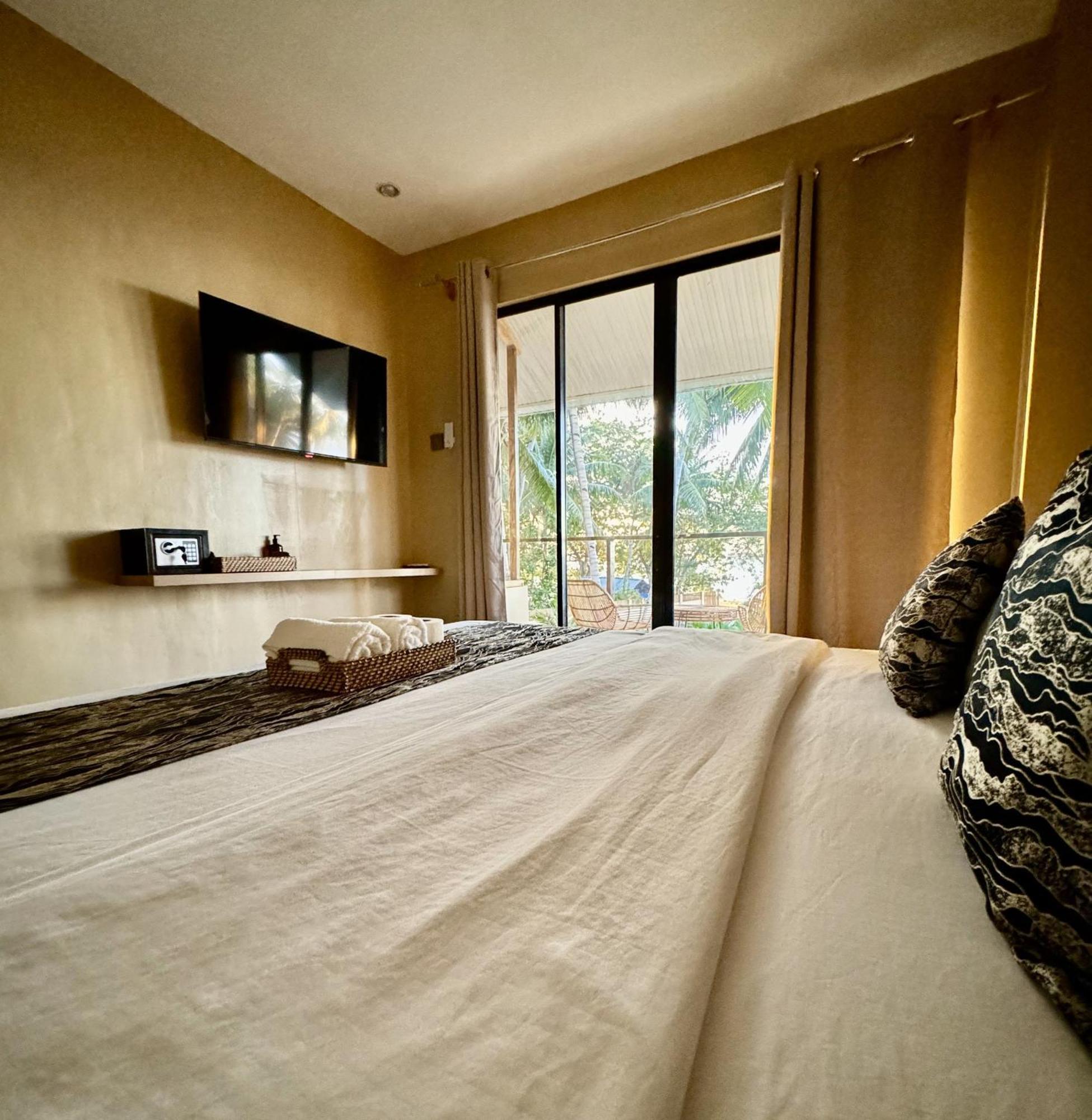 Southseas Beach Resort And Dive Center Santander Εξωτερικό φωτογραφία