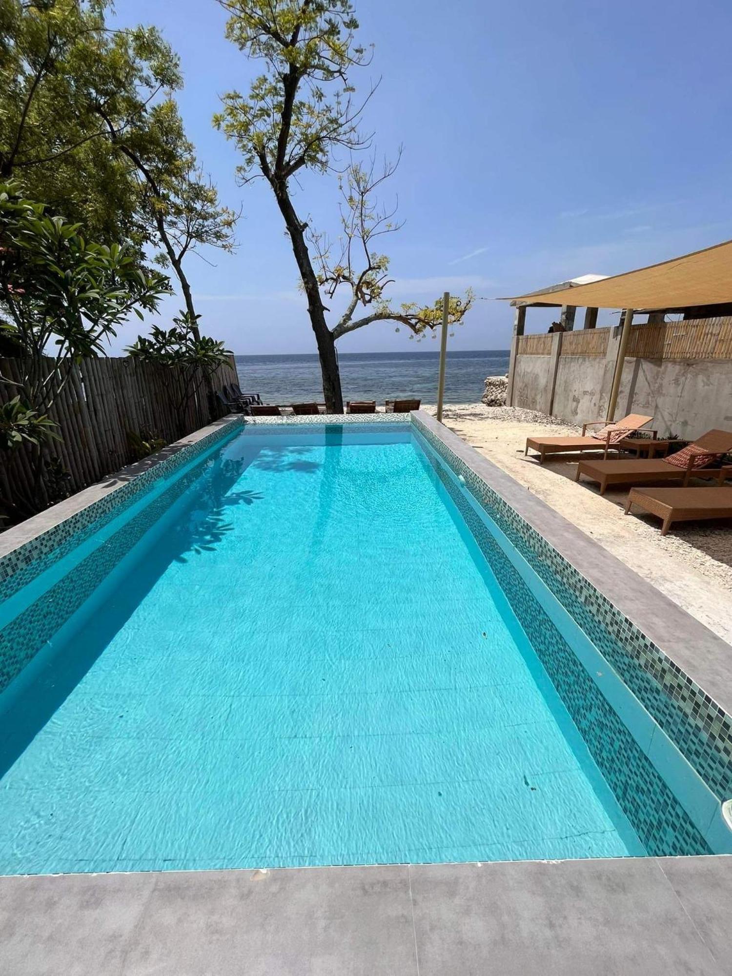 Southseas Beach Resort And Dive Center Santander Εξωτερικό φωτογραφία